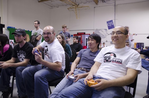 Jeff, far right, keeps his cool while Zak gets carried away at a Mario Tournament